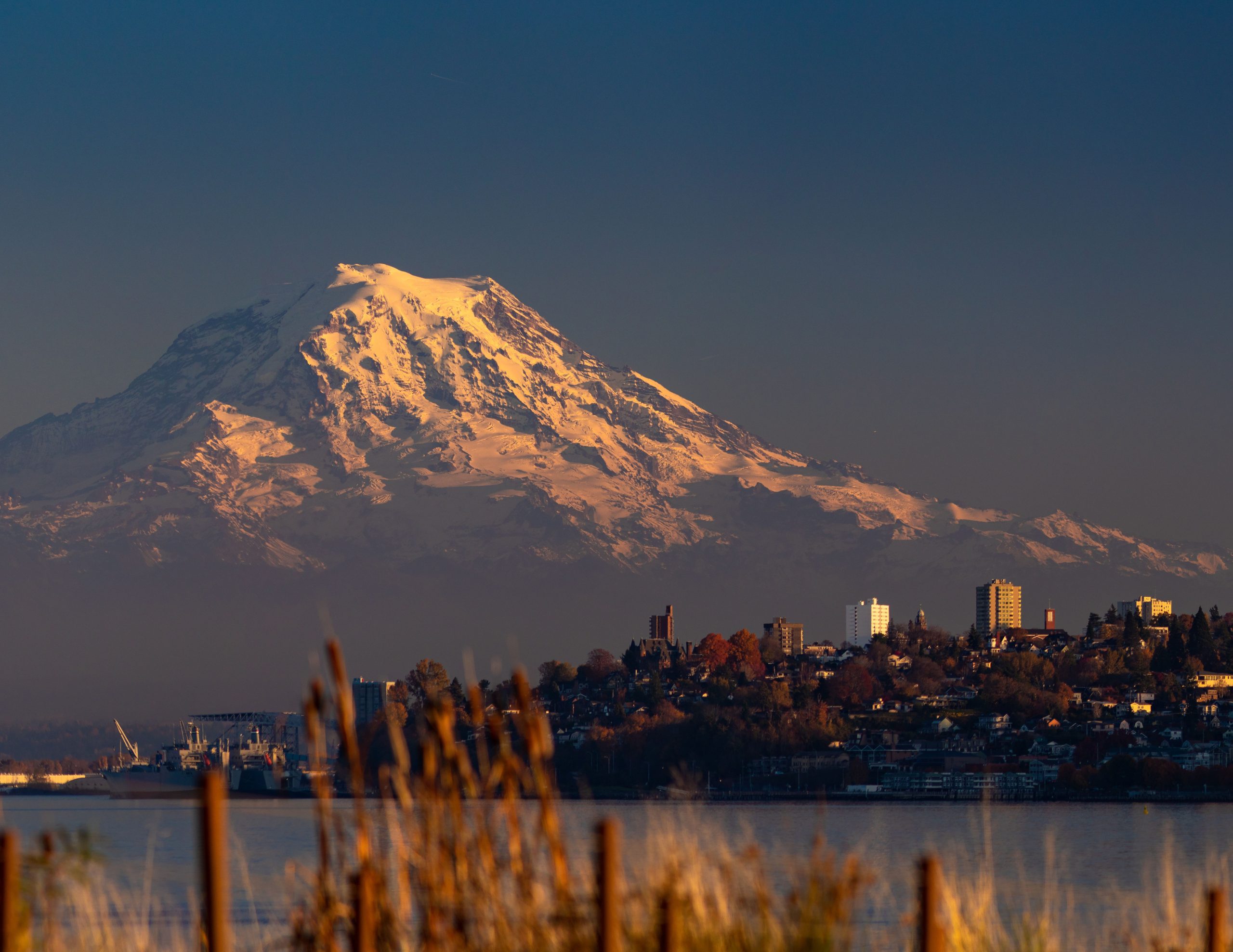 Mount Rainier with Tacoma cityscape.